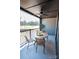 Outdoor balcony with seating and a view of the trees at 408 Old Town Village Rd, Waxhaw, NC 28173