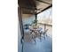 Cozy outdoor balcony with seating and a view of surrounding trees and landscape at 408 Old Town Village Rd, Waxhaw, NC 28173