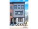 A gray and white townhome with dark window trim and a well manicured lawn at 408 Old Town Village Rd, Waxhaw, NC 28173