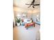 Well-lit living room boasts neutral tones, modern decor, a ceiling fan, and comfortable seating at 408 Old Town Village Rd, Waxhaw, NC 28173