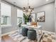 Bright office space with neutral walls, large windows, stylish lighting, and modern decor for a productive work environment at 408 Old Town Village Rd, Waxhaw, NC 28173
