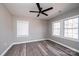 Bedroom featuring new flooring and windows for natural light, creating a serene and comfortable retreat at 4221 E Maiden Rd, Maiden, NC 28650