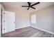 Comfortable bedroom features neutral walls, wood-look flooring, and a ceiling fan at 4221 E Maiden Rd, Maiden, NC 28650
