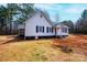 Charming exterior view showcasing the well-maintained siding and the home's inviting facade, nestled on a spacious lot at 4221 E Maiden Rd, Maiden, NC 28650