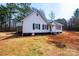 Charming exterior view showcasing the well-maintained siding and the home's inviting facade, nestled on a spacious lot at 4221 E Maiden Rd, Maiden, NC 28650