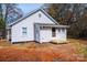 Exterior of a house featuring the entrance and a small deck, perfect for enjoying the outdoors at 4221 E Maiden Rd, Maiden, NC 28650