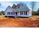 Exterior view featuring the home's siding, clean lines, and manicured surroundings at 4221 E Maiden Rd, Maiden, NC 28650