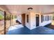 Inviting covered porch featuring a stylish door, perfect for relaxing and enjoying the outdoors at 4221 E Maiden Rd, Maiden, NC 28650