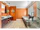 An elegant bathroom boasting double sinks, a soaking tub, and a glass-enclosed shower with stylish tile work at 4340 Rodeway Ne Ct, Hickory, NC 28601