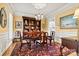 Formal dining room with hardwood floors, a decorative rug, and traditional furnishings at 4340 Rodeway Ne Ct, Hickory, NC 28601