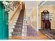 Warm foyer with hardwood floors, staircase, and traditional decor at 4340 Rodeway Ne Ct, Hickory, NC 28601