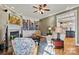 Inviting living area with a fireplace, built-in bookcase, and open access to the kitchen at 4340 Rodeway Ne Ct, Hickory, NC 28601