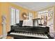 Piano room with white shutters, black piano, and recessed lighting at 4340 Rodeway Ne Ct, Hickory, NC 28601