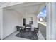 The covered patio featuring a ceiling fan and comfortable seating offers a relaxing outdoor space at 4631 Christina Ct, Gastonia, NC 28056