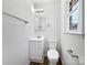 Cozy bathroom featuring a toilet, vanity, lighting, and a window offering natural light at 5012 Maplecrest Dr, Gastonia, NC 28056