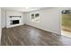 Bright living room with fireplace and backyard view at 5012 Maplecrest Dr, Gastonia, NC 28056