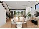 Elegant dining room features a large table, stylish chairs, and open design, perfect for gatherings and modern living at 5500 Carmel Rd # 101, Charlotte, NC 28226