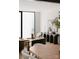 Open-concept space with modern furnishings, stylish accent tables, and a striking console table with decor at 5500 Carmel Rd # 101, Charlotte, NC 28226