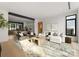Bright living room with open floor plan, modern furnishings, and stylish decor at 5500 Carmel Rd # 103, Charlotte, NC 28226
