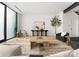 Cozy living room features modern furniture, minimalist decor, and ample natural light at 5500 Carmel Rd # 103, Charlotte, NC 28226