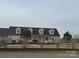 Charming one-story home with dormer windows, a covered front porch, and landscaping at 6795 Jones Rd, Salisbury, NC 28147