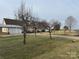 Inviting one-story home featuring a covered parking area, an attached garage and well-maintained front yard at 6795 Jones Rd, Salisbury, NC 28147