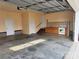 Spacious garage featuring built-in cabinets with a sink and a range at 6795 Jones Rd, Salisbury, NC 28147
