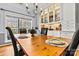 Elegant dining area with built-in cabinets and a view of the backyard at 7331 Sedgebrook W Dr, Stanley, NC 28164