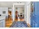 Welcoming foyer with hardwood floors, elegant columns, and views into the living spaces at 7331 Sedgebrook W Dr, Stanley, NC 28164