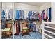 Large walk-in closet with ample storage and blue rug at 7331 Sedgebrook W Dr, Stanley, NC 28164