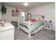 Cozy bedroom featuring a full bed, plush decor, and charming window with great natural light at 7456 Hartsfield Dr, Lancaster, SC 29720