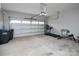 Clean, spacious garage with overhead door, treadmill, and plenty of room for parking and storage solutions at 7456 Hartsfield Dr, Lancaster, SC 29720