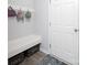 Mudroom with built-in bench, storage, and convenient hooks for organizing coats and bags near the door at 7456 Hartsfield Dr, Lancaster, SC 29720