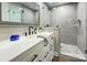 Bathroom featuring gray tile, a modern sink, and a walk-in shower at 7611 Buckland Rd, Charlotte, NC 28278