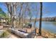 Lake view deck with comfortable outdoor seating at 7611 Buckland Rd, Charlotte, NC 28278