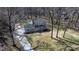 Aerial view of a two-story single Gathering home with a driveway at 8125 Appaloosa Ln, Charlotte, NC 28215