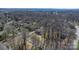 Aerial view of a single Gathering home nestled among trees at 8125 Appaloosa Ln, Charlotte, NC 28215