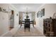 Classic dining room featuring a chandelier, area rug, and decorative accents at 8125 Appaloosa Ln, Charlotte, NC 28215