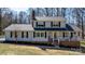 Charming two-story home with black shutters and a welcoming front porch at 8125 Appaloosa Ln, Charlotte, NC 28215