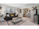 Cozy living room featuring neutral walls, plush seating, and decorative accents at 8125 Appaloosa Ln, Charlotte, NC 28215