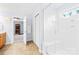 Bathroom featuring a glass-enclosed shower with a built-in seat and natural light at 963 Brookdale Ln, Stanley, NC 28164