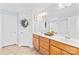 Bathroom with a double vanity, ample countertop space, and stylish hardware at 963 Brookdale Ln, Stanley, NC 28164