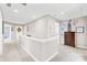 Second floor landing with a decorative chest and views into other rooms at 963 Brookdale Ln, Stanley, NC 28164