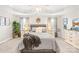 This spacious bedroom features a trey ceiling, neutral walls, two windows and carpeted floors at 963 Brookdale Ln, Stanley, NC 28164
