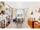Bright office with built-in bookshelves, a desk, and a window providing natural light at 963 Brookdale Ln, Stanley, NC 28164