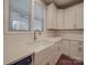 Bright kitchen featuring white cabinets, subway tile backsplash, quartz countertops, and stainless steel appliances at 0000 Trull Hinson Rd # 2, Wingate, NC 28174