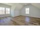 Spacious bedroom with high ceilings, hardwood floors, and scenic windows at 1022 Harrogate Dr, Bessemer City, NC 28016