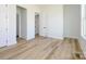 Bedroom featuring bright white walls and light colored hardwood floors at 1022 Harrogate Dr, Bessemer City, NC 28016