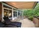 Cozy deck area with patio seating under a retractable awning, perfect for outdoor gatherings and relaxation at 1040 Lyndon Dr, Lancaster, SC 29720