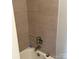 Clean bathtub with tile and silver fixtures at 1111 Pondella Dr # 66, Charlotte, NC 28213